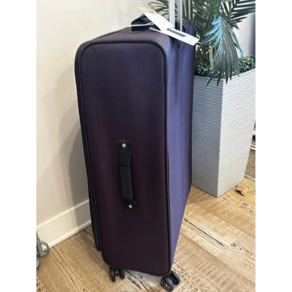 Skyway Epic Large Check-in Spinner Softside purple Suitcase luggage